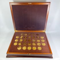 The Complete Works of Vemeer - set of 31 gilt silver medals, by John Pinches - approx weight