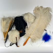 Two boxes of feathered fans, headdresses & other costume items