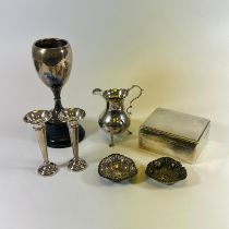 A Georgian silver cream jug, a pair of weighted silver post vases, approx 11cm tall. A pair of