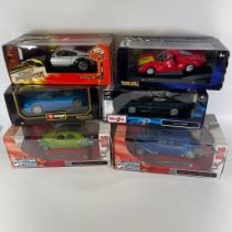 Six boxed 1:18 scale diecast cars Maisto, Burago and Joyride Studios