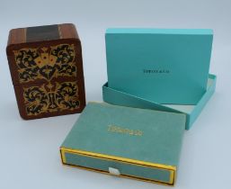 A boxed set of two decks of Tiffany and Co playing cards, together with two 2002 Commonwealth