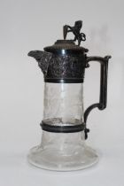 Frederick Elkington ( Elkington and Co), a Victorian silver mounted claret jug. The lion and and