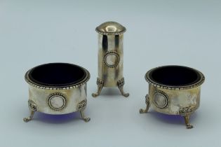 Christopher Lawrence, a Queen Elizabeth II silver three piece condiment, each of cylindrical form