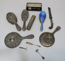 A mixed quantity of silver and silver mounted items, including embossed silver backed dressing table