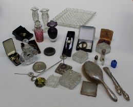 A small quantity of silver mounted dressing table items including two perfume bottles, a hand brush,