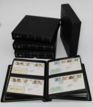 A collection of in excess of two hundred first day of issue stamps, each within four albums. 1980'