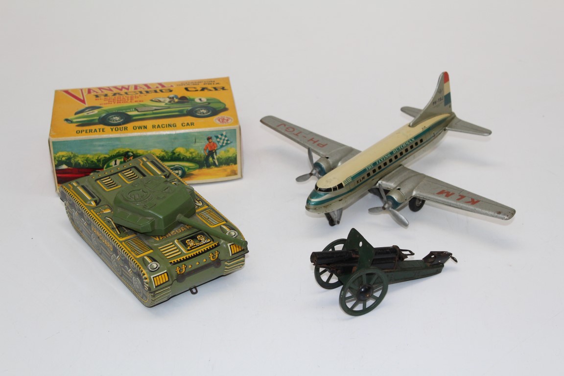 A circa 1950 selection of tin plate toys including Electric remote controlled Vanwall racing car,