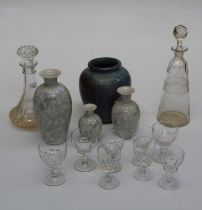 A small quantity of glassware, including two decanters and a part suite of Port and Sherry