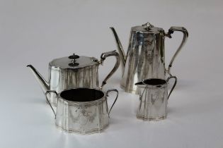 Martin Hall and Company, a Victorian silver four piece tea/coffee service , each of shaped panel