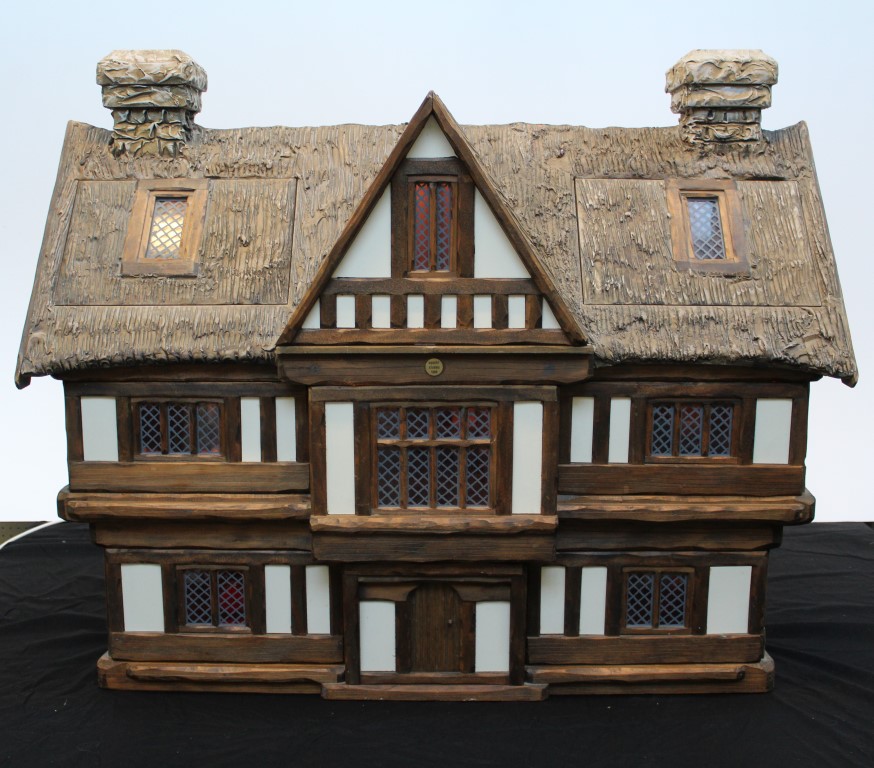 A Tudor Dolls Houses Doll's House by Robert Stubbs. Hand crafted as a thatched cottage with