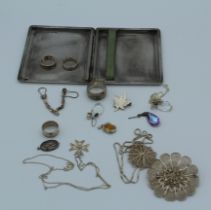 A collection of silver and white metal jewellery to include a cigarette case ( at fault)