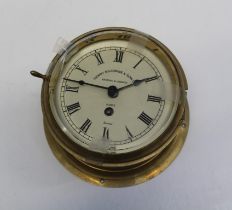 Henry Braowne and Son Ltd, a mid 20th brass ship's clock with drum case enclosing an eight day