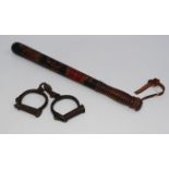 A late 19th / early 20th century painted police constable's truncheon, together with a pair of