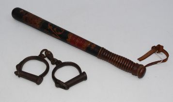 A late 19th / early 20th century painted police constable's truncheon, together with a pair of