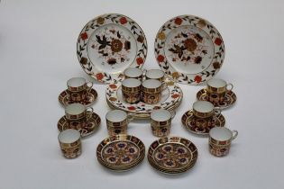 Royal Crown Derby for Tiffany and Co, a set of six floral Imari decorated 22cm diameter plates