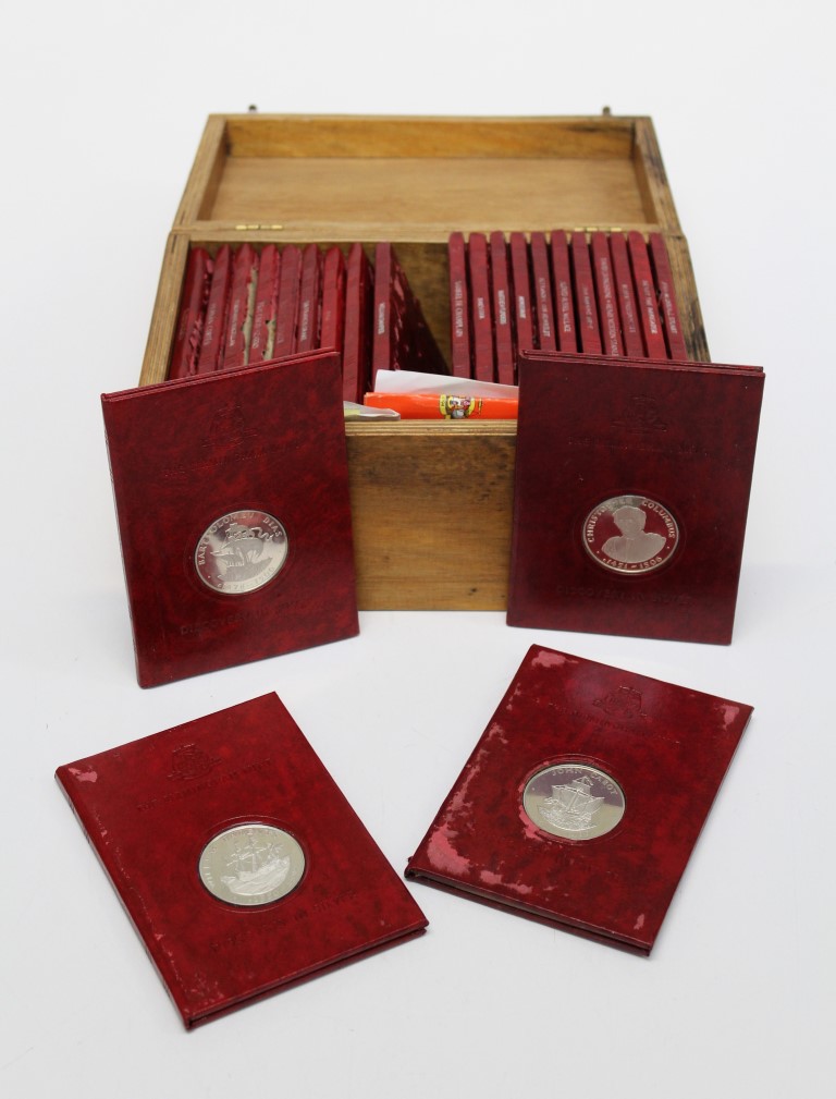 A set of Twenty Four Birmingham Mint Discovery Collection in silver commemorative medallions in