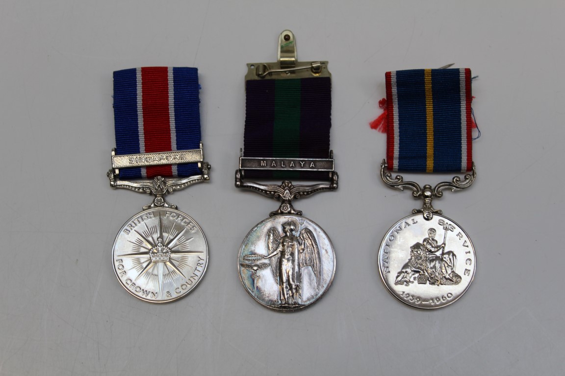 A General Service medal, Malaya Bar, to A.C.1 T G Mason 4104358 RAF, together with a British