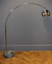 A large Scandinavian style chrome floor lamp, the circular marble base issuing a slender