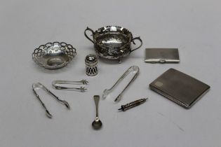 Two silver cigarette cases, a pierced silver bonbon dish, various dates and makers, together with