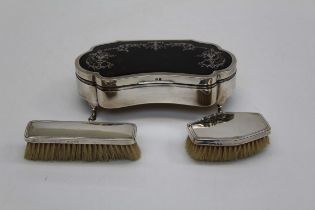 Mappin and Webb, a George V silver and tortoiseshell jewellery box of shaped outline with hinged