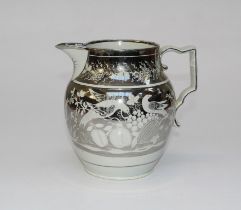 An early 19th century Sunderland silver lustre jug of large size decorated with buds and fruit,