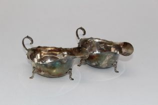 Bruford and Son, a pair of George VI silver sauce boats, each with wavy rim on three trefoil feet.