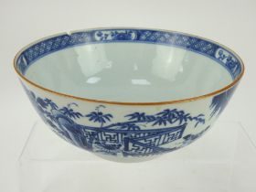 A Chinese porcelain late 18th/early 19th century blue & white decorated bowl. 19.5cm diameter.