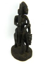 A large African carving of a figure on horseback, probably Dogon, 20th century. Height 56cm.