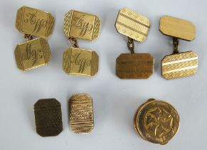 A pair of 9ct gold cufflinks, a similar pair of 10ct gold fronted cufflinks, and a gilt stud.