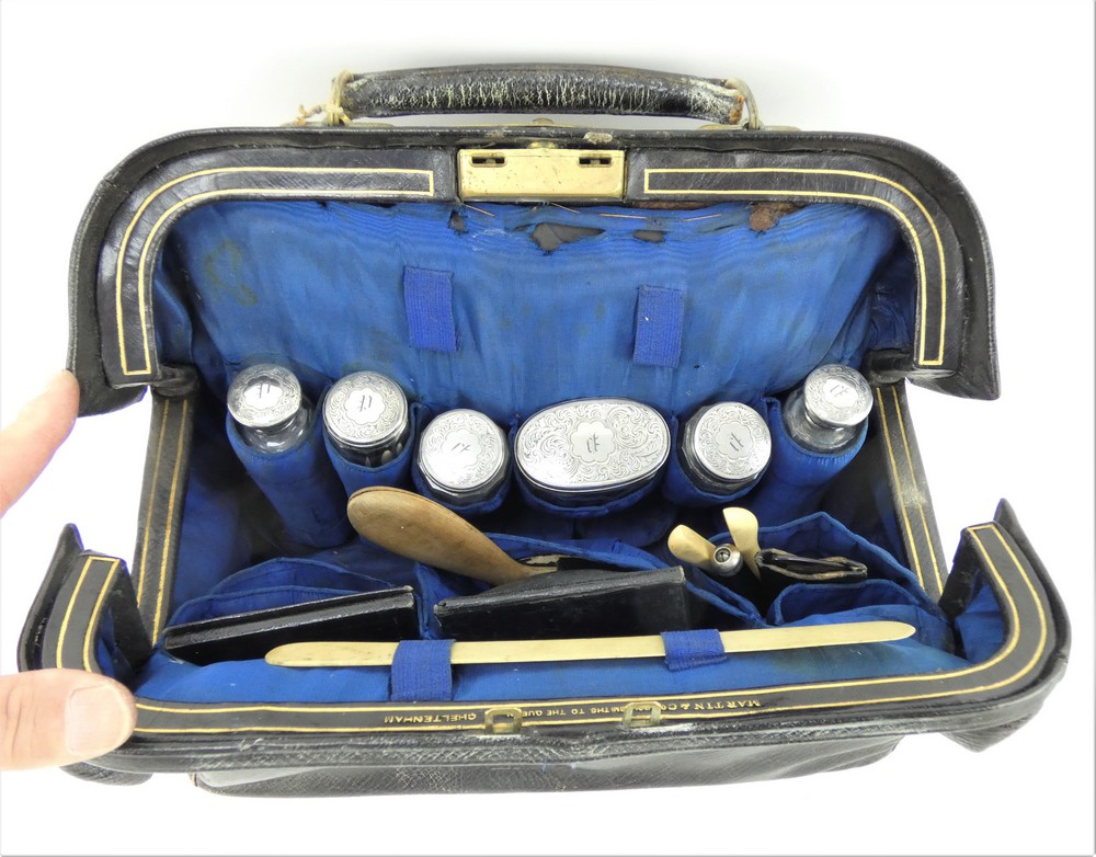 Victorian fitted gentleman's travel bag by Martin & Co with silver topped jars and other contents. - Image 2 of 8