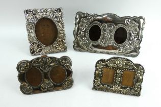 Four decorative Peruvian silver fronted picture frames of various size including two double frames