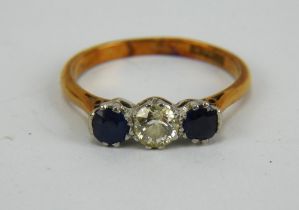 An antique diamond and sapphire trilogy ring marked 18ct Plat. Size Q. Gross weight 3.6 grams