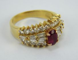 A ruby and diamond cluster ring