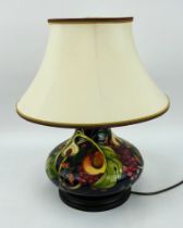 W Moorcroft pottery table lamp in Queen's Choice pattern, designed by Emma Bossons, with silk shade.