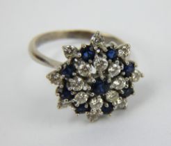 A sapphire and diamond cluster ring