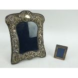 An antique style hallmarked silver fronted picture frame, 16cm x 21cm & a small silver fronted frame