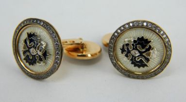 A pair of 14ct gold, plat & diamond Russian cufflinks bearing an imperial eagle with Faberge,marks