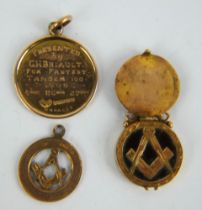 Two 9ct gold Masonic fobs, one with cover, and a 9ct gold athletics medal dated 1908