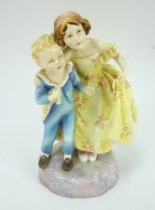 Royal Worcester figure 'Sister' modelled by F G Doughty. Yellow dress version. Height 18cm.