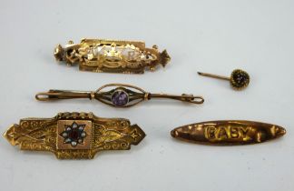 Four antique 9ct gold bar brooches, one commemorating Queen Victoria's Diamond Jubilee