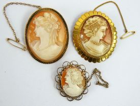 Three 9ct gold mounted carved cameo brooches, c1960s, each with safety chains. Largest 4.5cm x 3.5cm