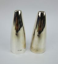 Pair of Georg Jensen Henning Koppel silver salt & pepper pots, design no 1102. Height 8.5cm