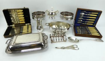 Mixed silver plated wares including wine coasters, cutlery, toast rack, serving dishes etc grape she