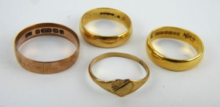 3 gold wedding bands, 22ct, 18ct & 9ct, and a 9ct ladies signet ring.Gross weight 9.8 grams.