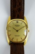 1970s Universal Geneve 18ct gold Golden Shadow Automatic wristwatch on crocodile skin strap.