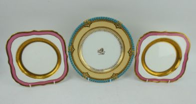 A Worcester W P & G Philllps Late Chamberlain armorial plate and two Royal Worcester Caldwell plates