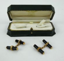 Pair of 9ct gold and black onyx chain link cufflinks in fitted leather box. Gross weight 8.3 grams.