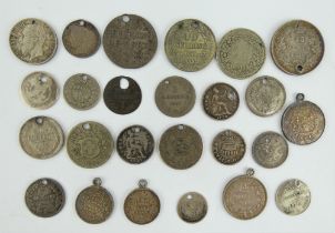 Selection of mainly silver 18th and 19th century coin charms.