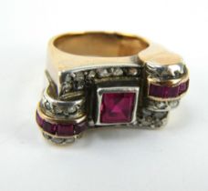 Large Art Deco gold, ruby and diamond ring of assymetric design. Size L.