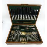 An 8 setting Dixon A1 silver plated canteen of cutlery, c1930s, in a fitted oak canteen with key.